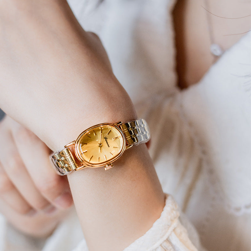 Mujeres ovales de reloj de acero de ámbito medio