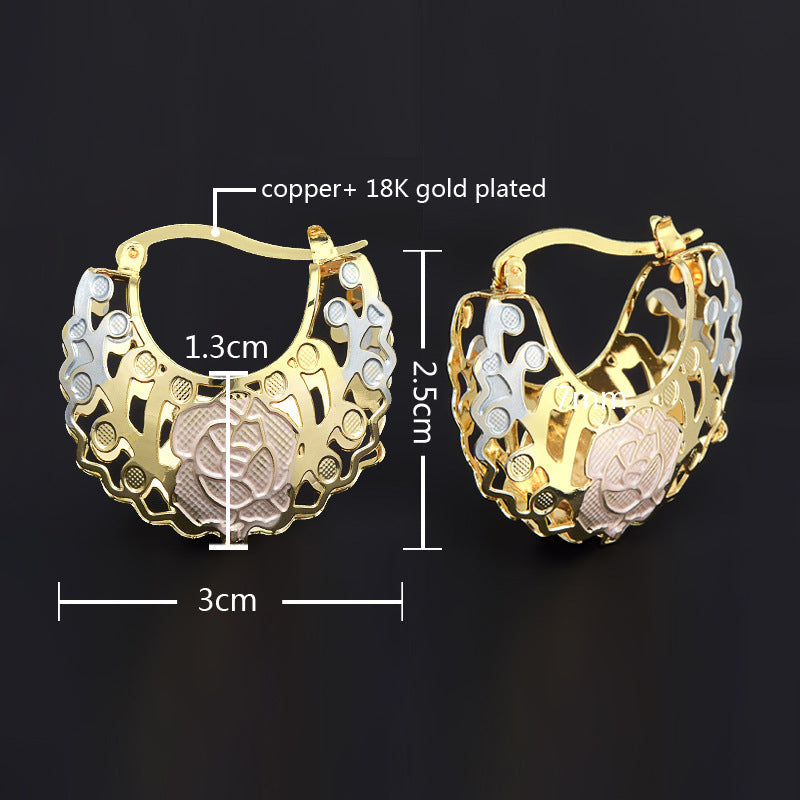 Boucles d'oreilles rosettes creuses avec cerceaux de contraste d'or