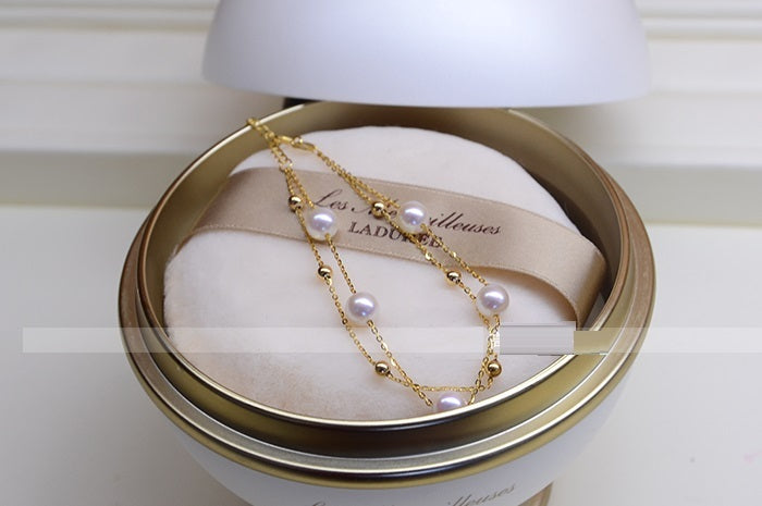 Bracelet à double couche réglable de la perle en or 18 carats