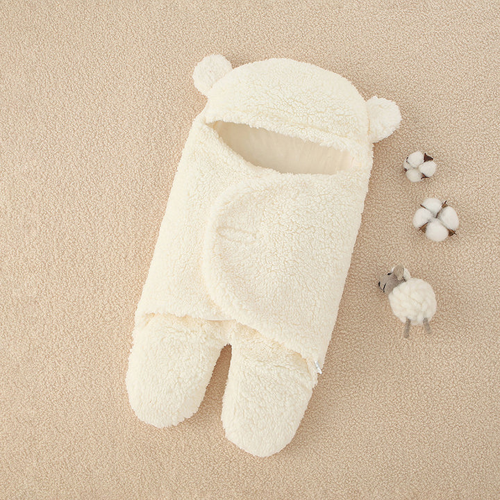 Sovepose for spedbarn som skal holdes av nyfødt