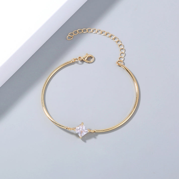 Zinklegering elleboogbuis goud vergulde koper micropaved zirkoon hanger -armband