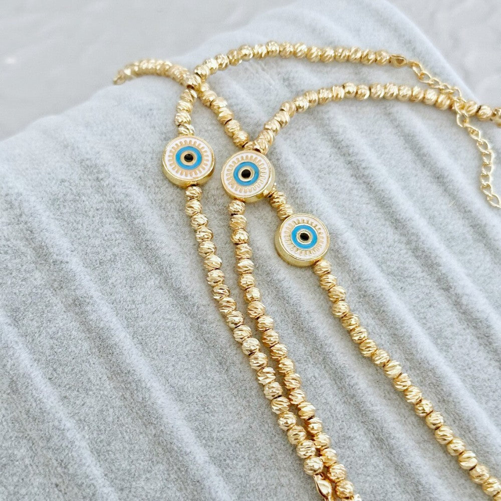 Perlen 18K kupfergepantetes goldenes glückliches blaues Augenarmband