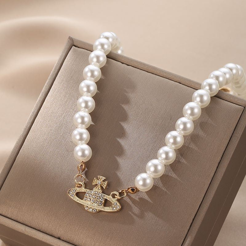 Muince Pearl cruthaitheach agus trendy, muince pendant Satarn diamant na mban, muince