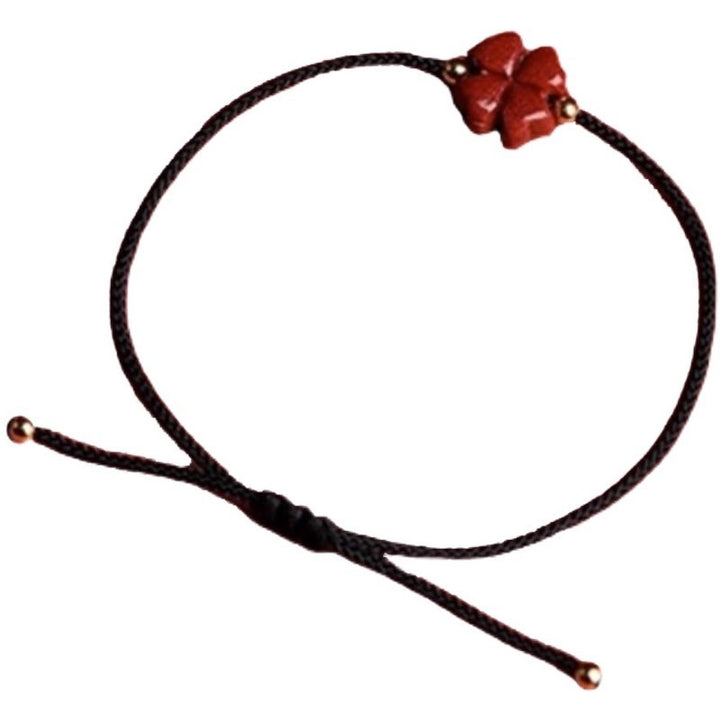 Pulseira de corda vermelha de Cinnabar Clover