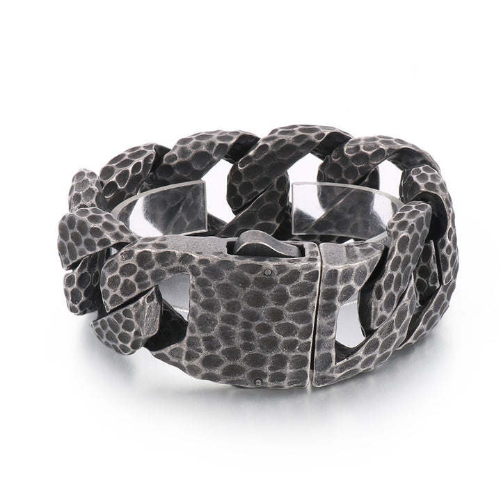 Snap -knop oude gekookte zwart beat -patroon titanium stalen armband