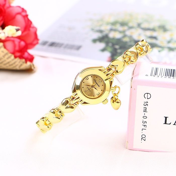 Pulsera de corazón de cinturón de acero de cuarzo reloj para mujeres