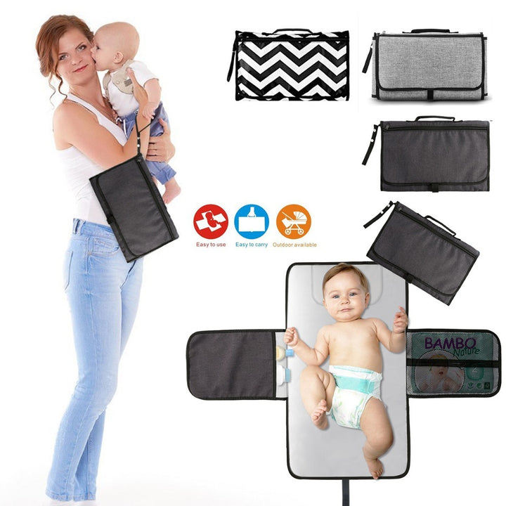 Bebé portátil plegable plegable compacto pañal cambiante alfombra impermeable alfombra de piso de baby baby tap y bolsa de almacenamiento